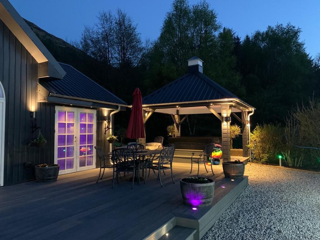 Little Fox Lodge's entrance, decking with seating and hot tub area all private for guest use.