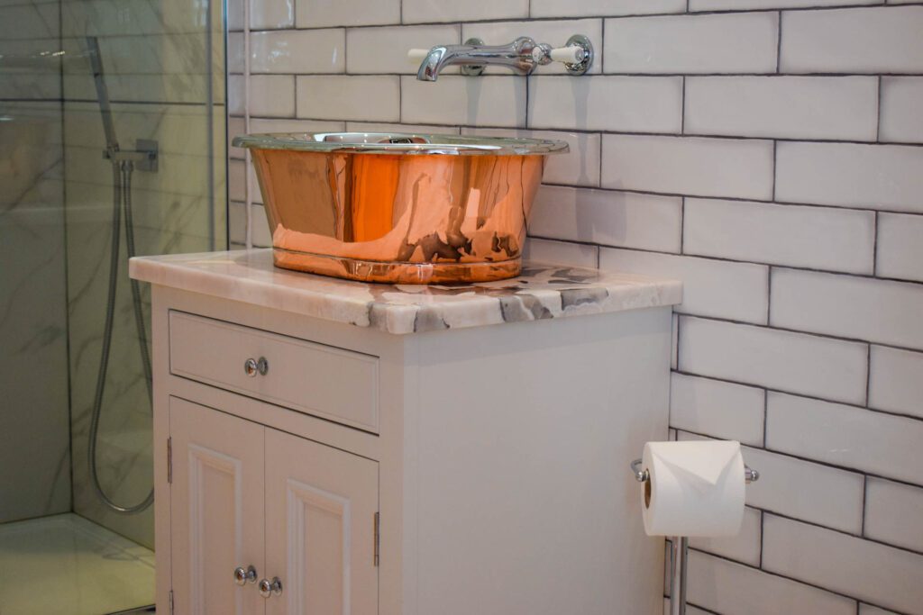The copper and chrome detailing in Little Fox Lodge Hideaway is stunning.